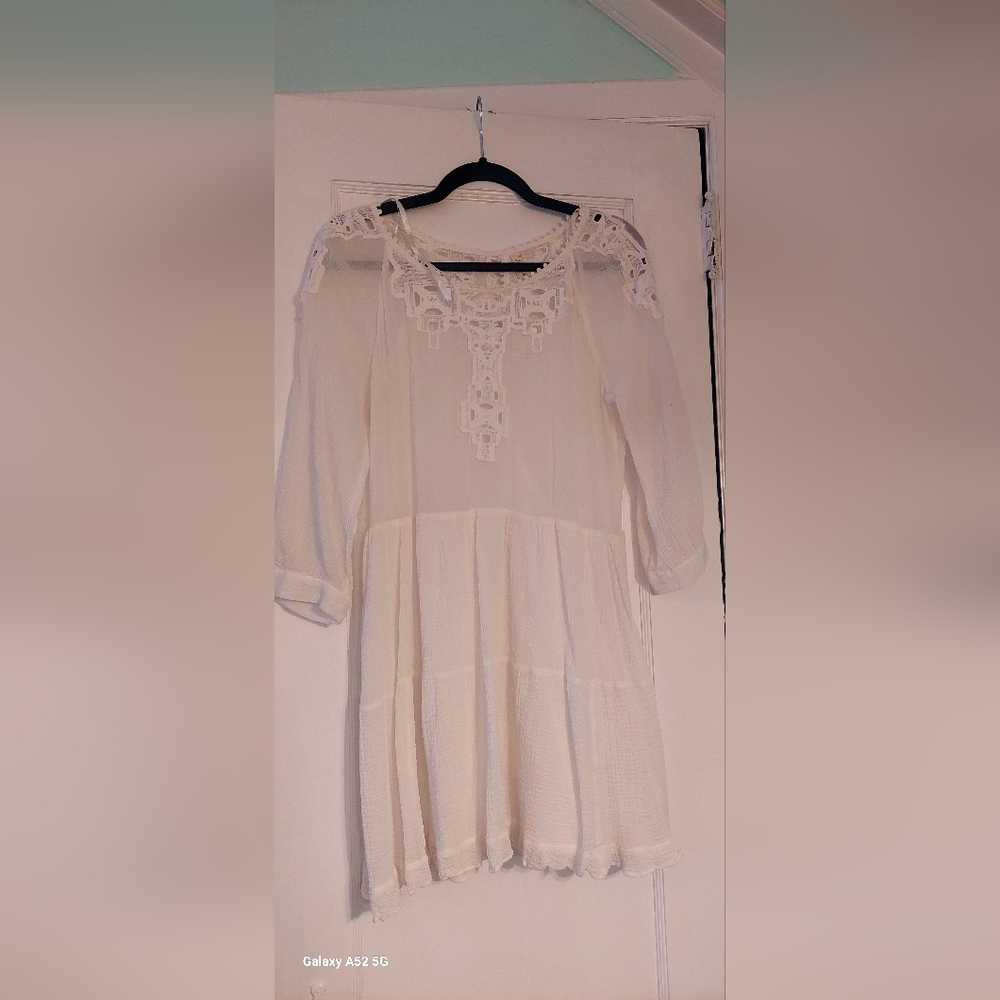 Free people mini dress. The dress has a nice swing at the bottom